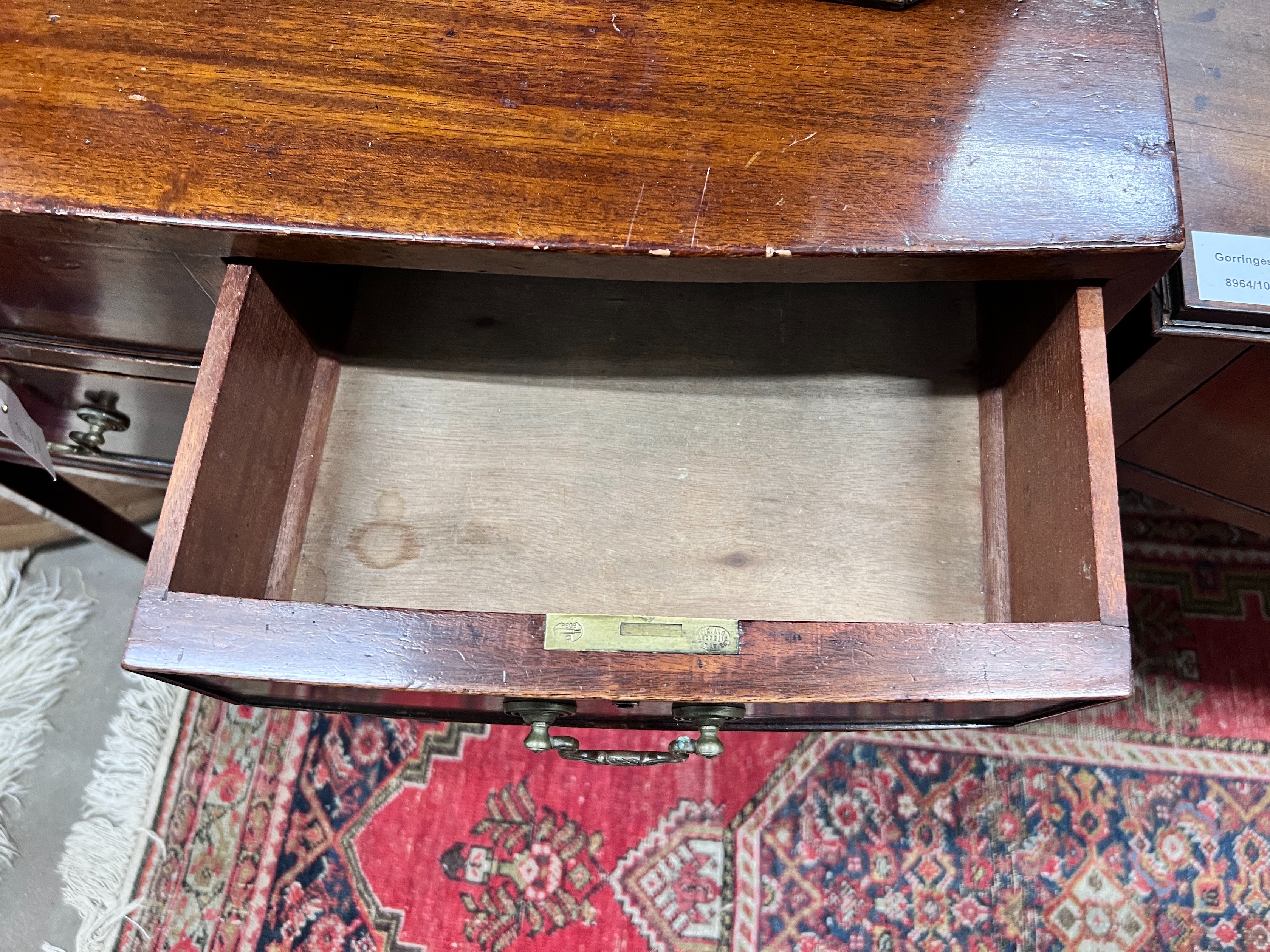 A small 1920's mahogany bowfront three drawer chest, width 71cm, depth 49cm, height 78cm *Please note the sale commences at 9am.